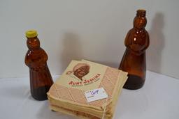 Pair of Vintage Mrs. Butterworth's Brown Syrup Bottles and Vintage Aunt Jemima Paper Napkins