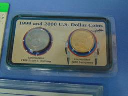 Lot of Four Dollar and Penny Coin Sets