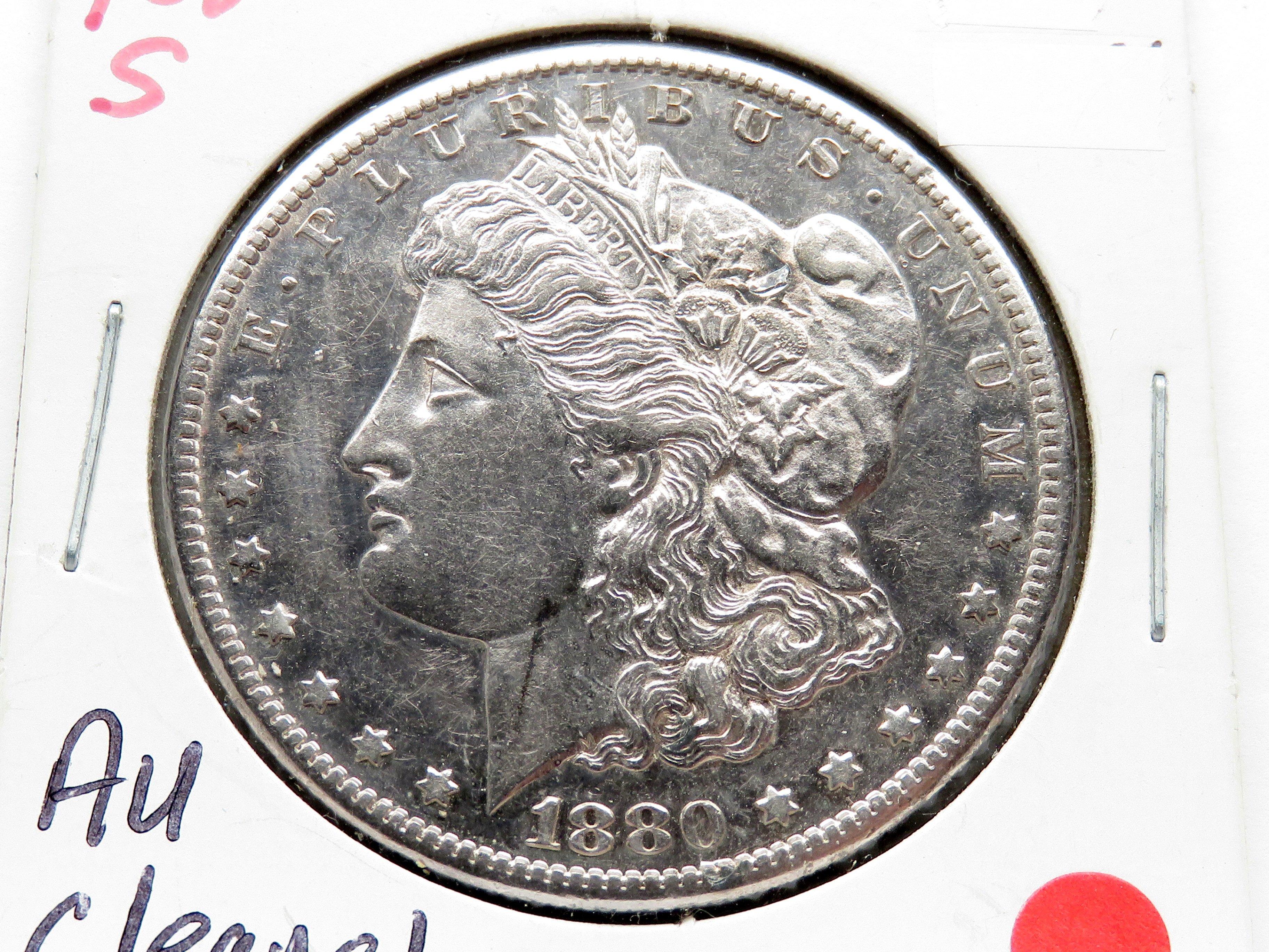 2 Morgan $ : 1880 AU harshly cleaned, 1880S AU cleaned