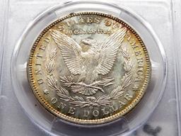 Morgan $ 1899-O PCGS MS65, toning