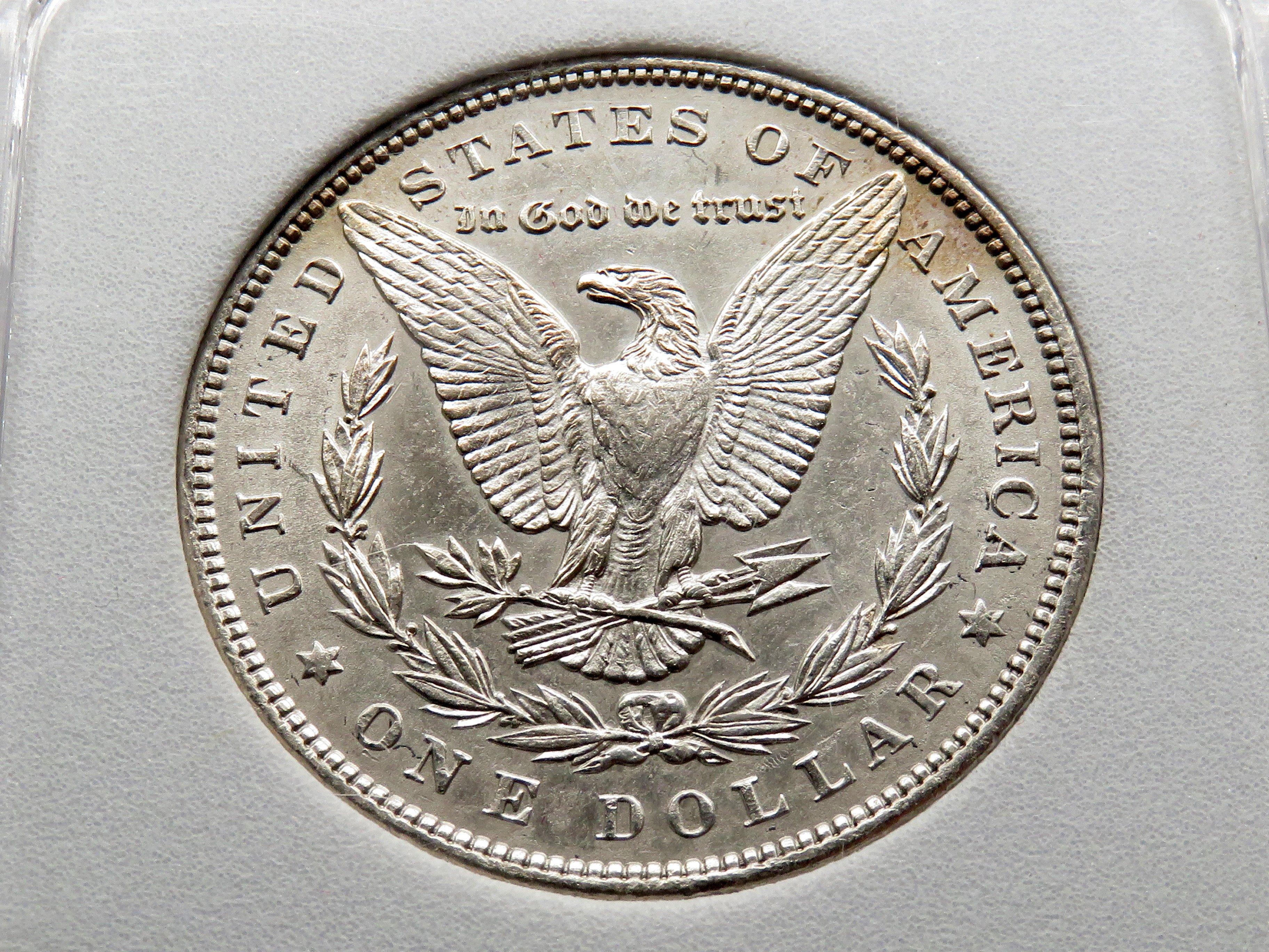 Morgan $ 1890 NNC Mint State (Toned obverse)