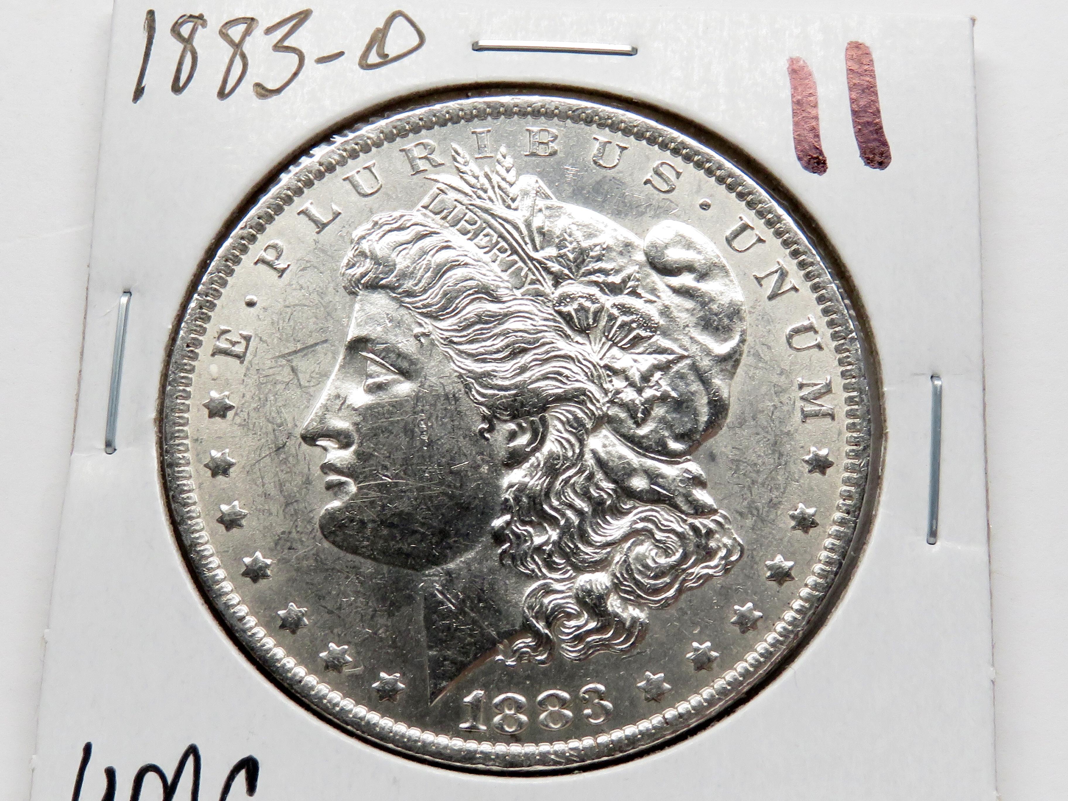 Morgan $ 1883-O Unc