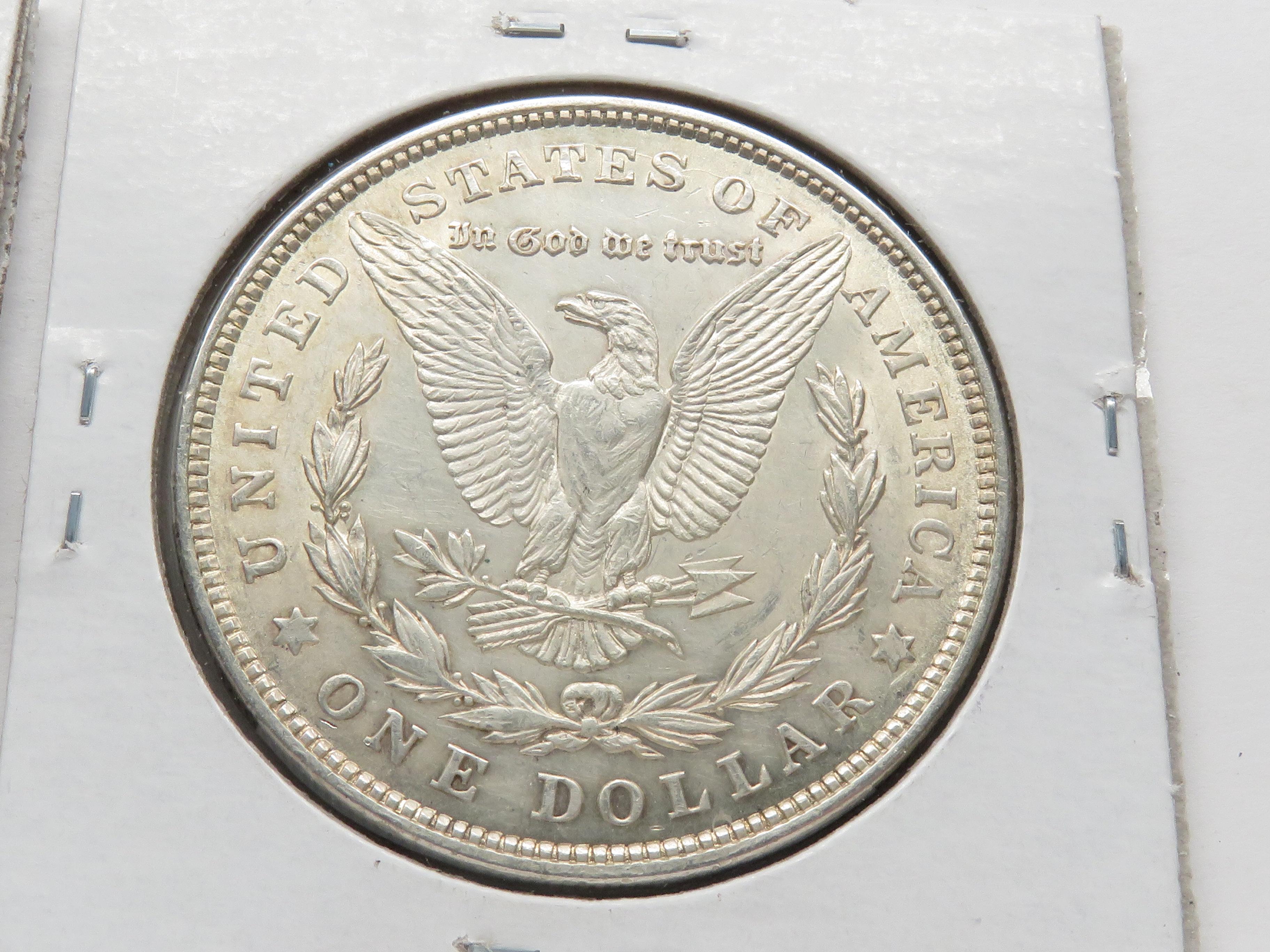 2 Morgan $: 1897S Unc ?PVC residue, 1921 Unc clea