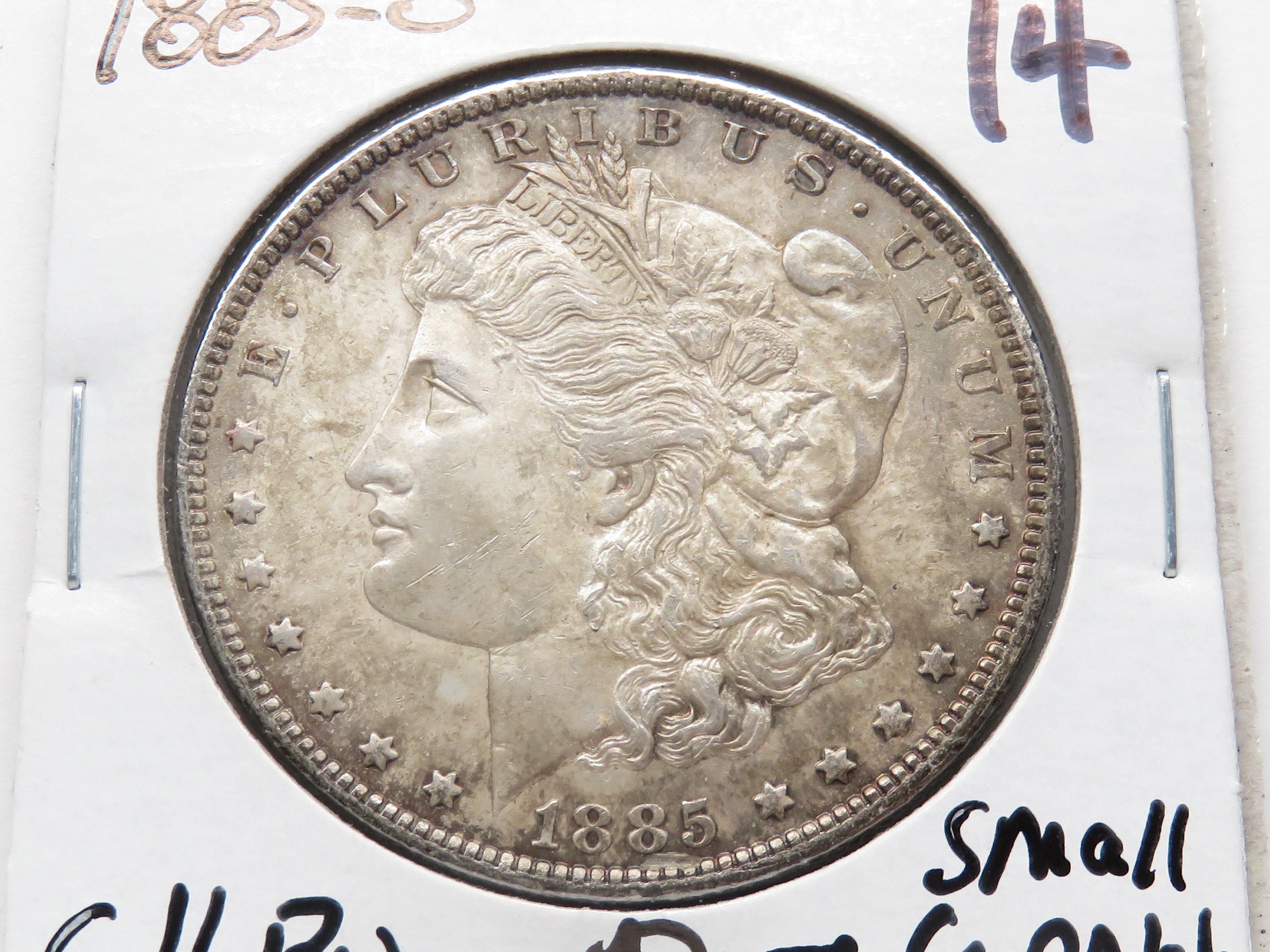 Morgan $ 1885-O CH BU small scratch