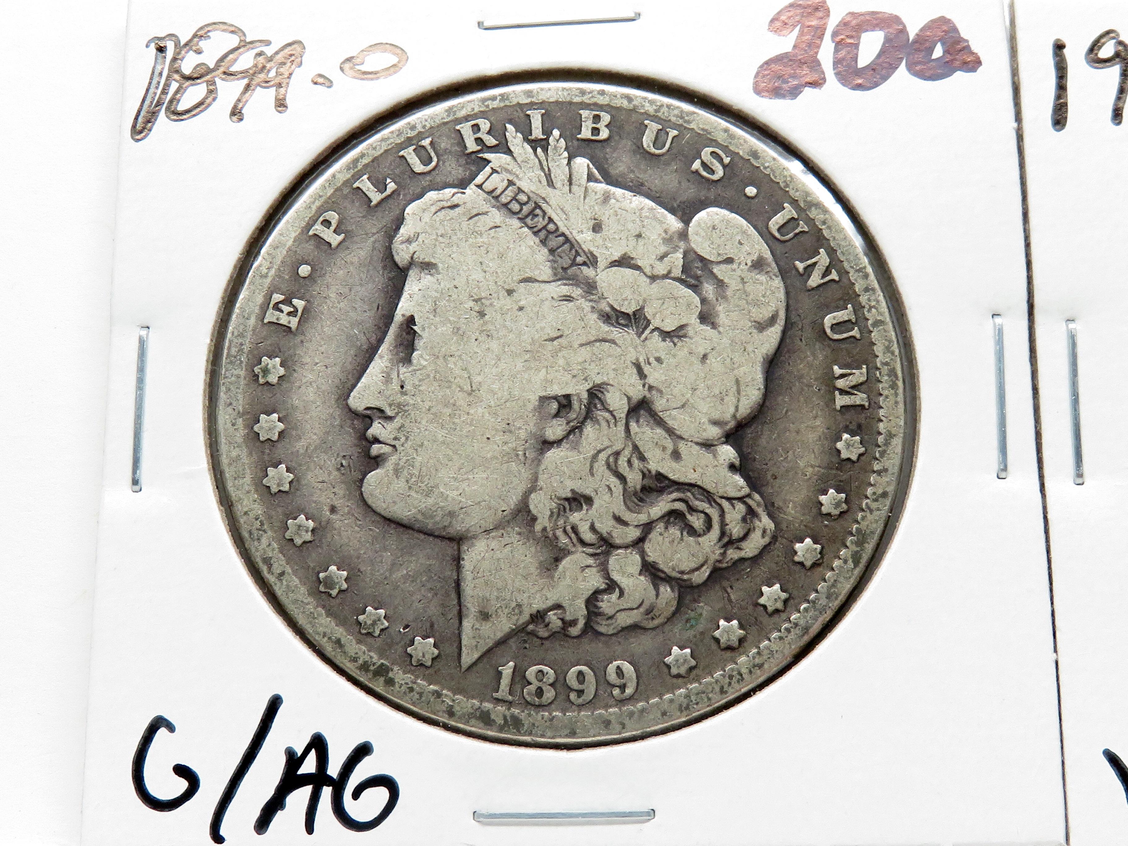 2 Morgan $: 1899-O G/AG, 1904S VG harshly clea