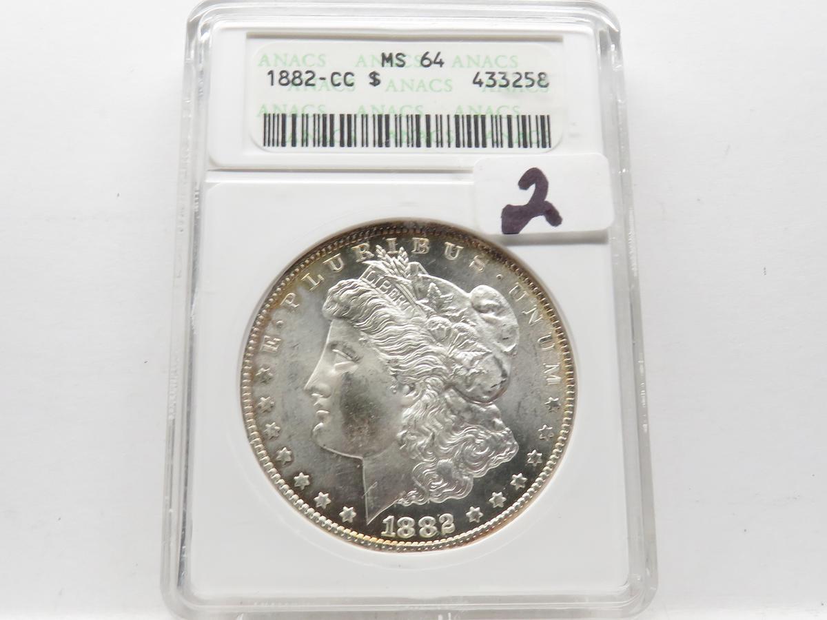 Morgan $ 1882CC ANACS MS64, rim toning older holder, looks PF-Like to us