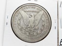 2 Morgan $: 1879S 3rd rev VG, 1881S EF cleaned