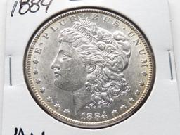 2 Morgan $: 1883 Unc, 1884 AU