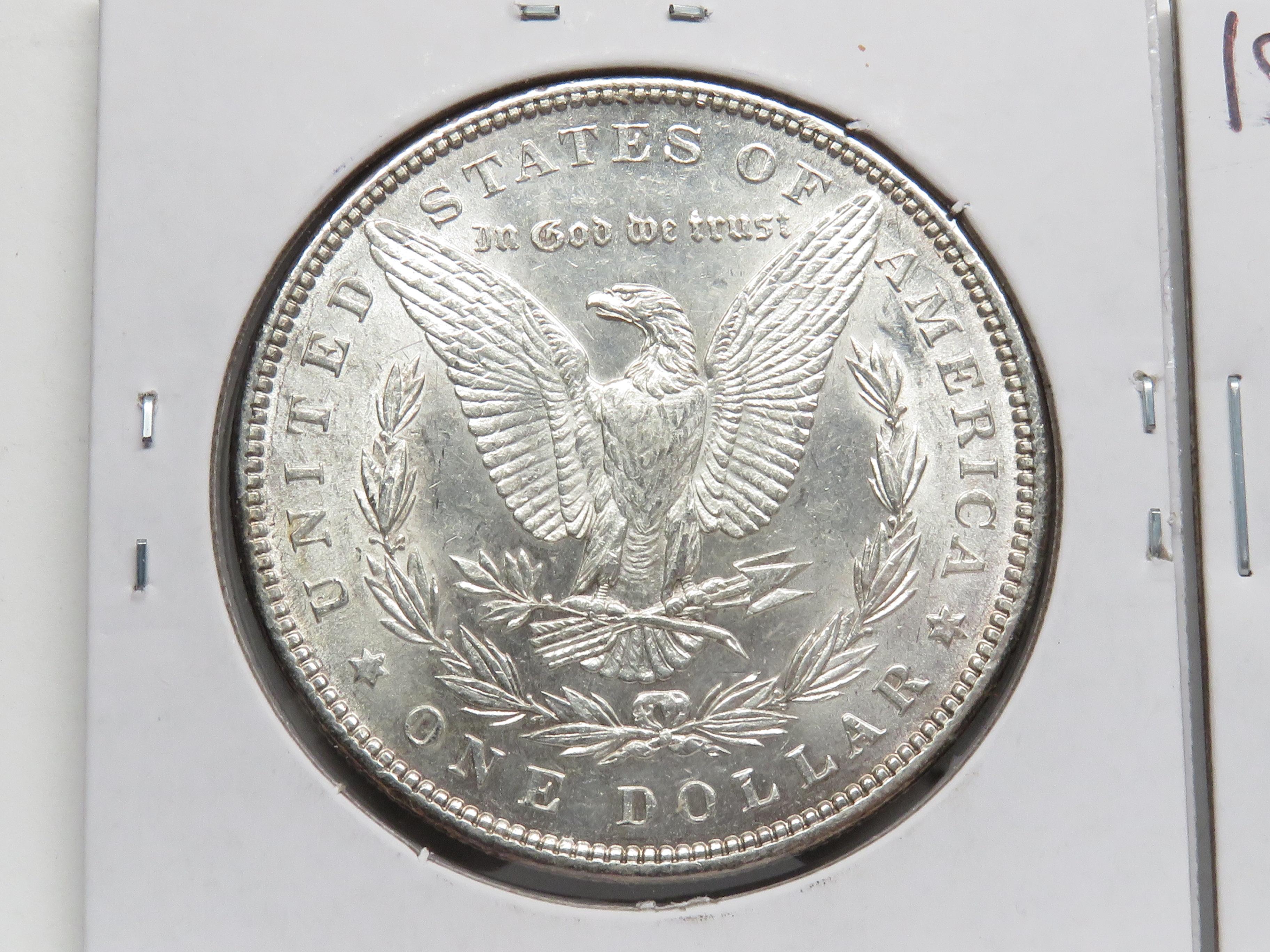 2 Morgan $: 1889 CH AU, 1889-O AU ?cleaned