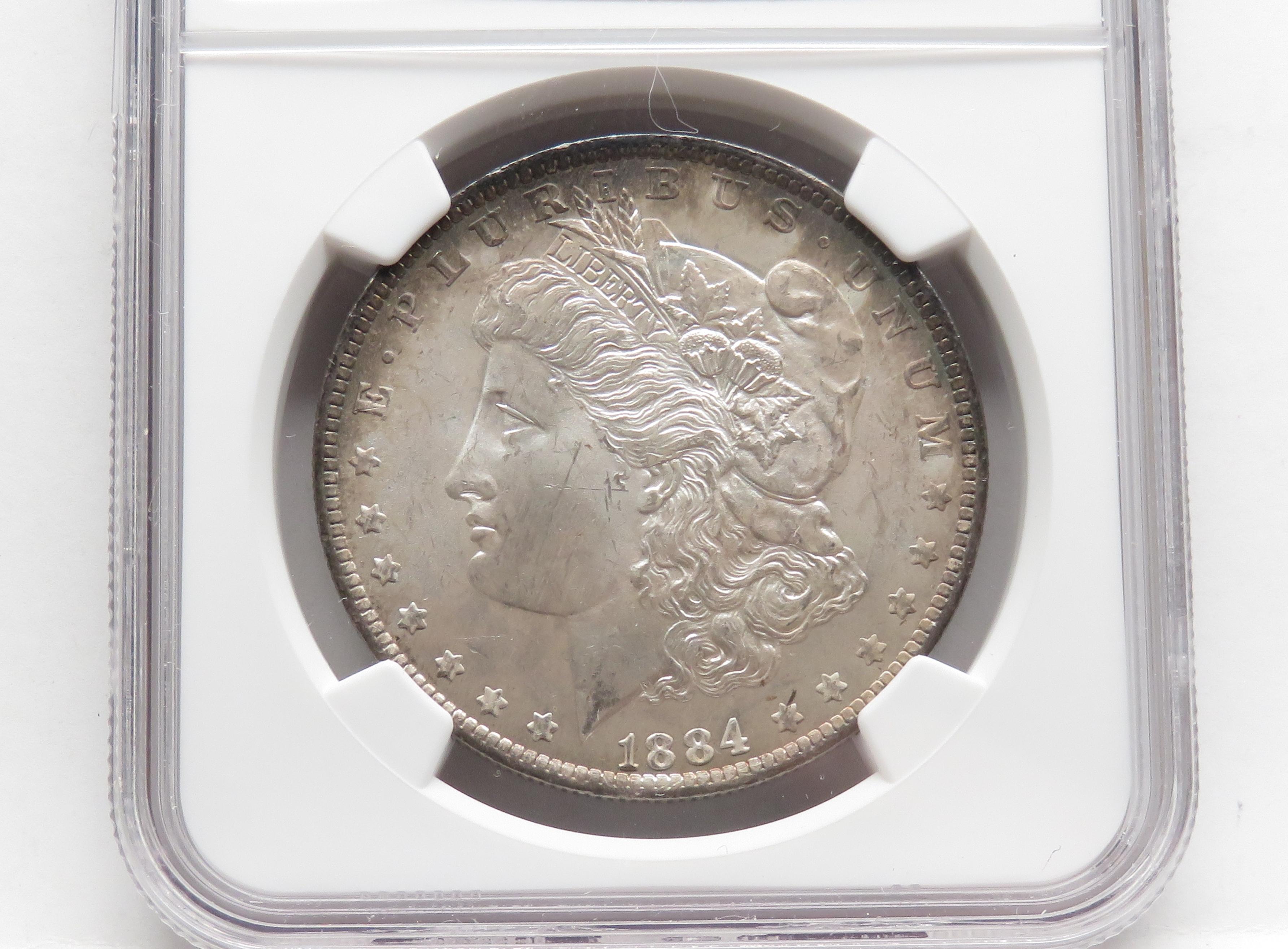 Morgan $ 1884-O NGC MS64