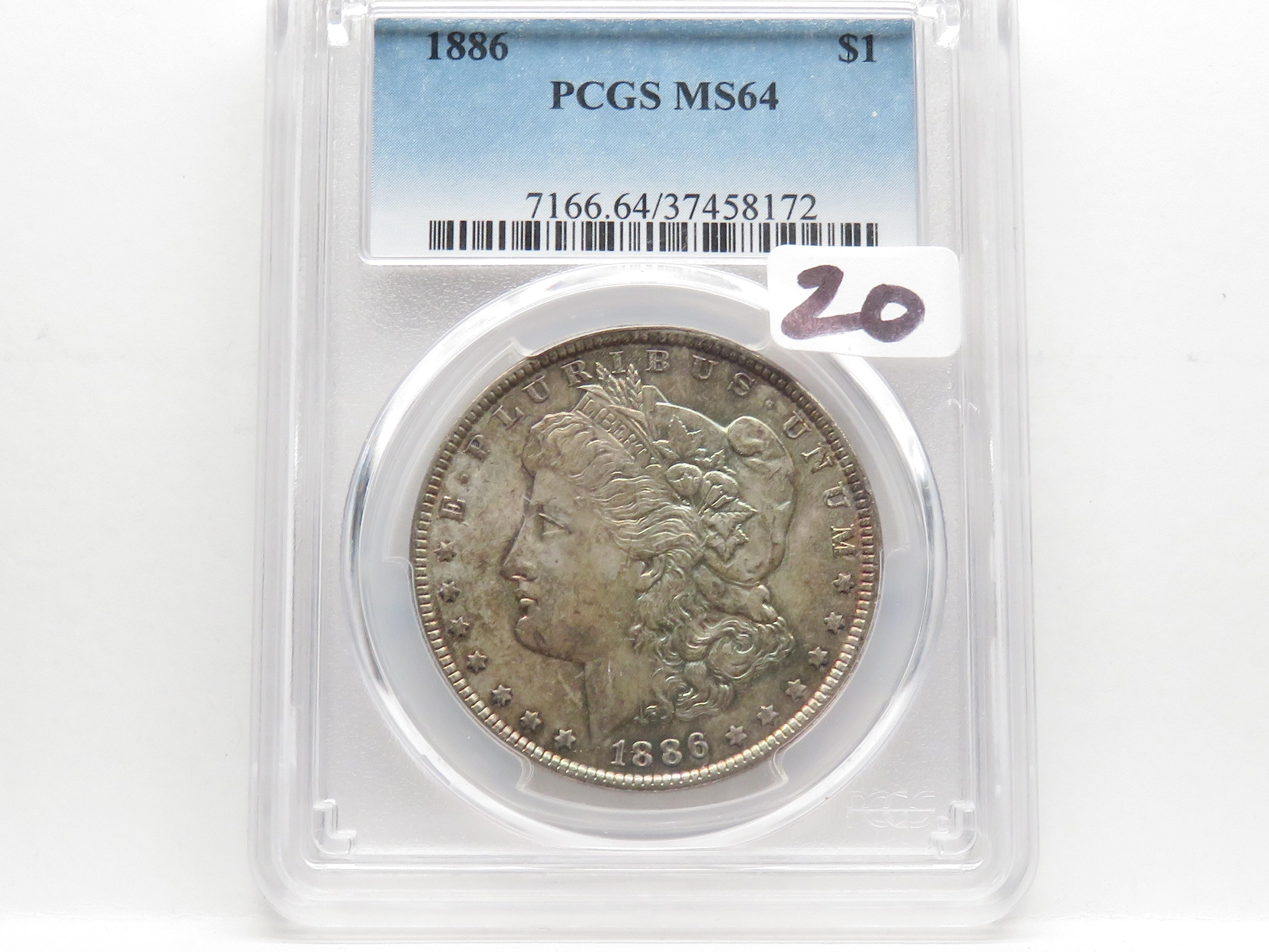 Morgan $ 1886 PCGS MS64 (Nice rainbow toning)