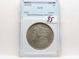 Morgan $ 1879-CC NNC AU55 Capped Die (Better date)