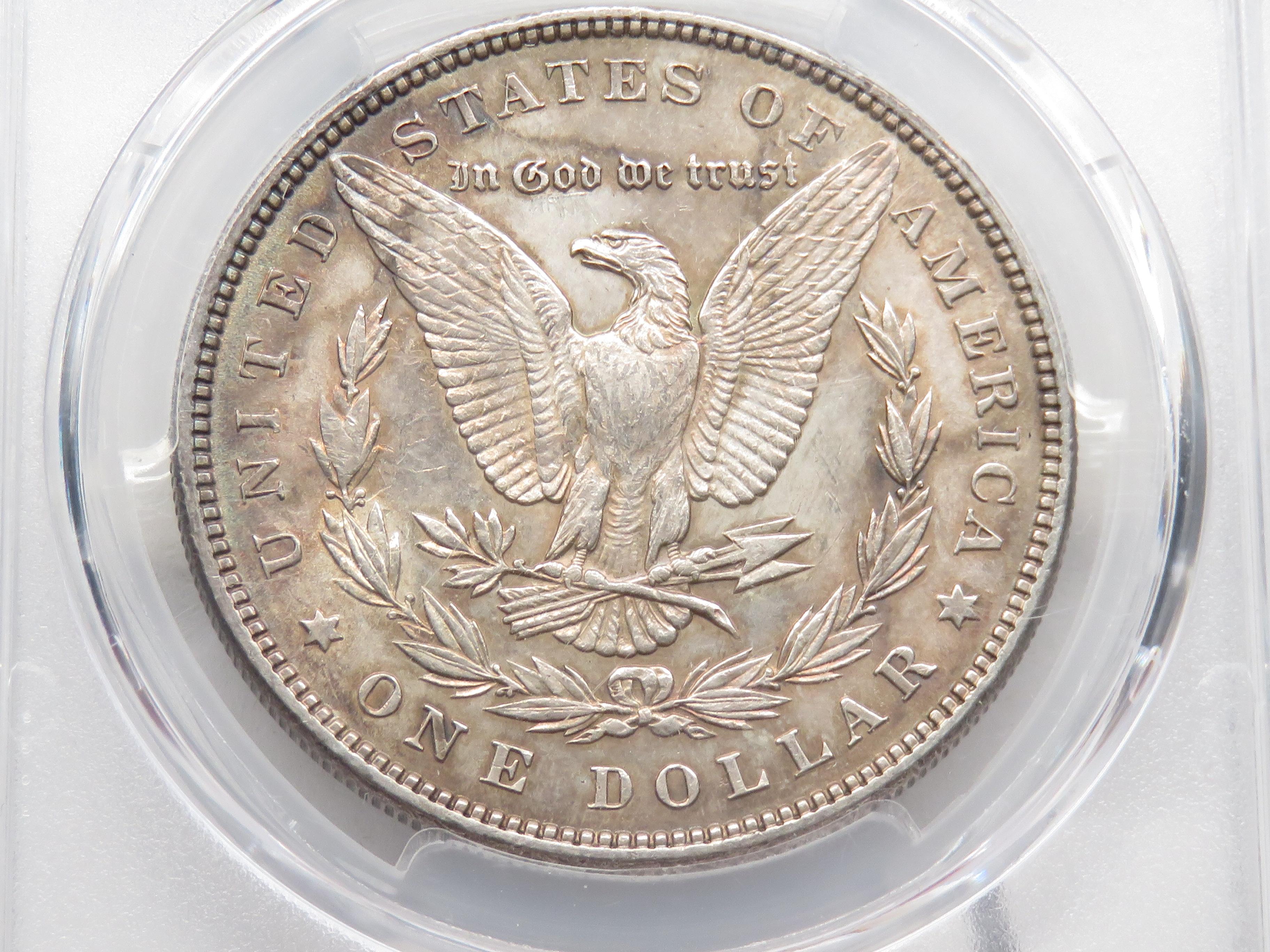 Morgan $ 1887 PCGS MS61, toning