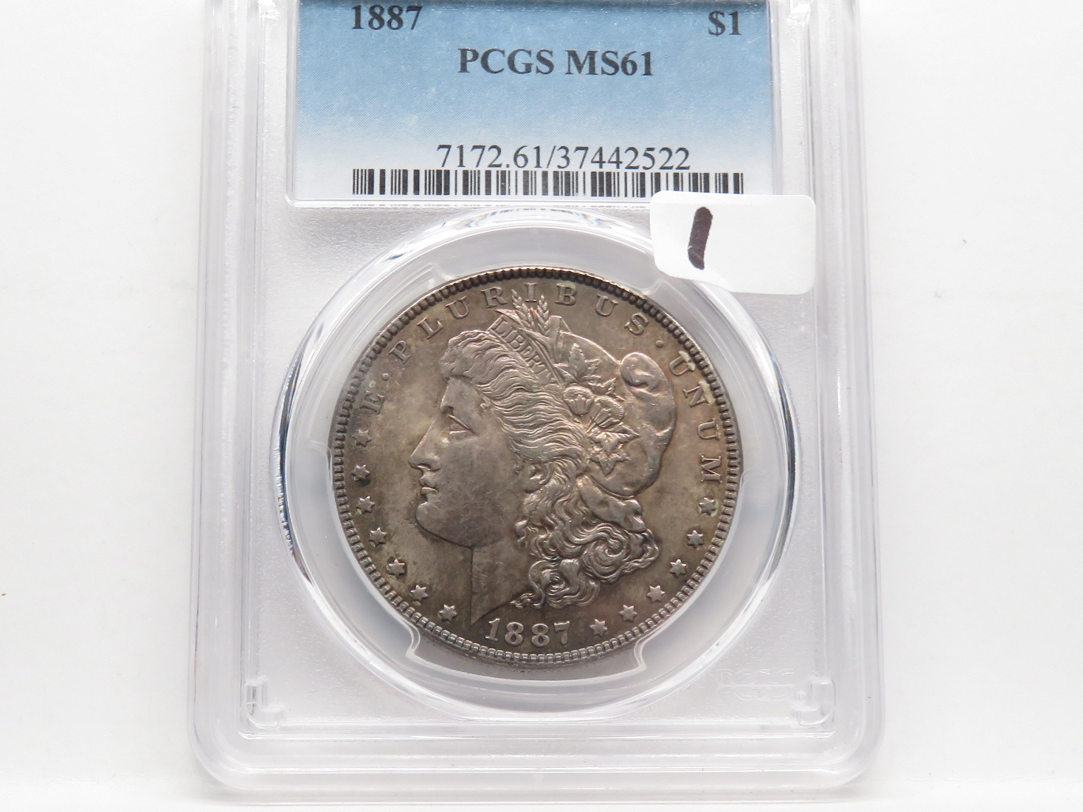 Morgan $ 1887 PCGS MS61, toning