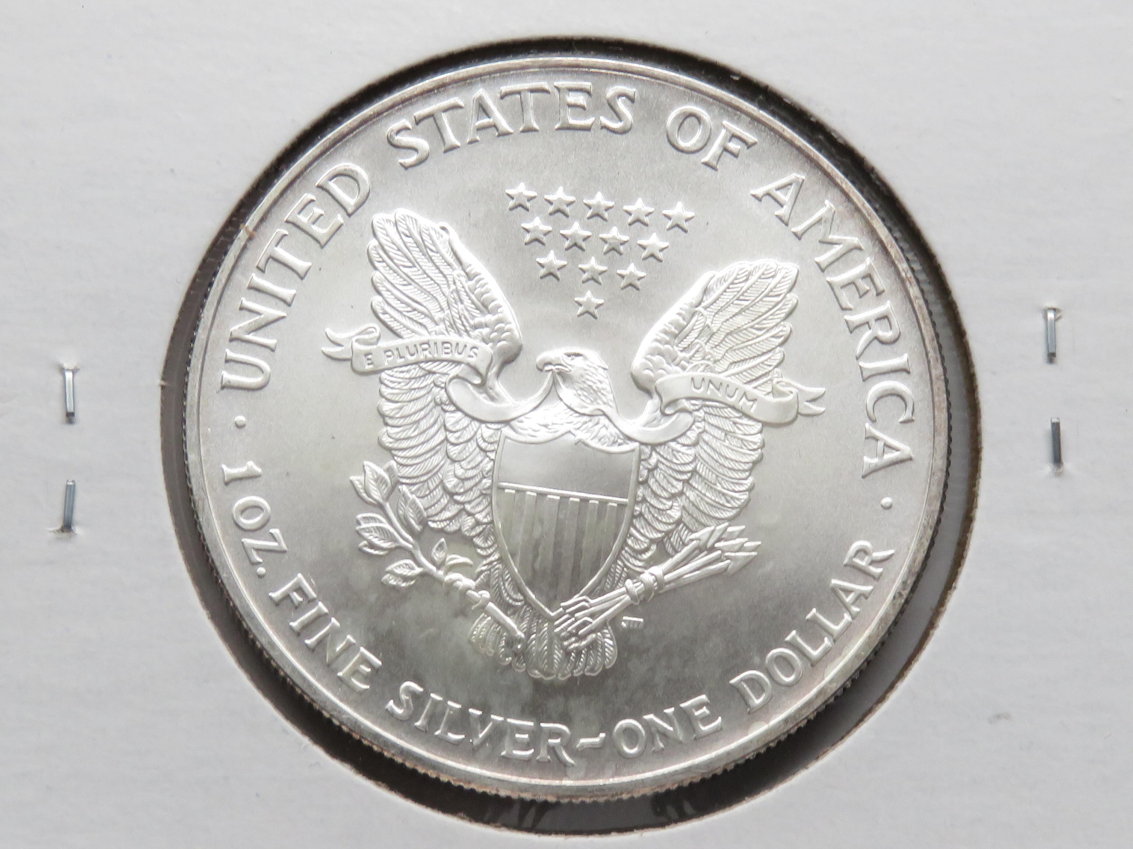 2009 Silver American Eagle Gem BU lightly toned
