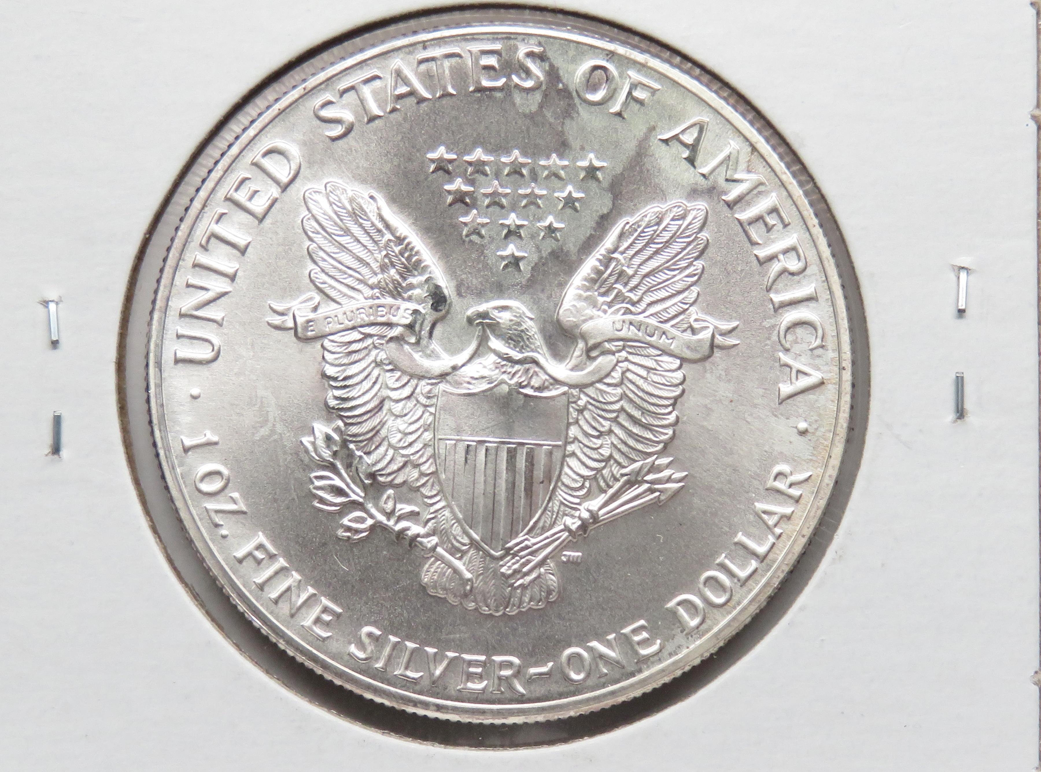 1986 Silver American Eagle BU lightly toned