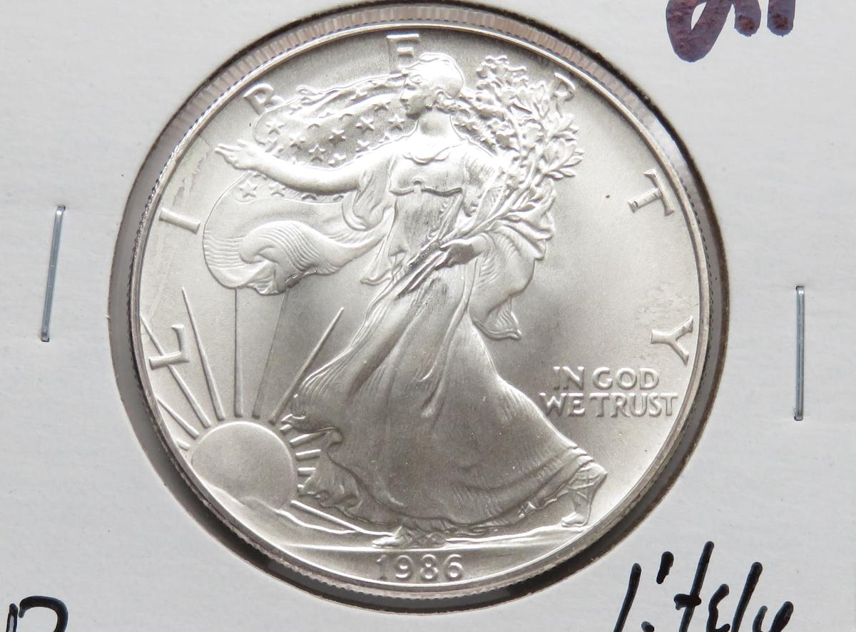 1986 Silver American Eagle BU lightly toned