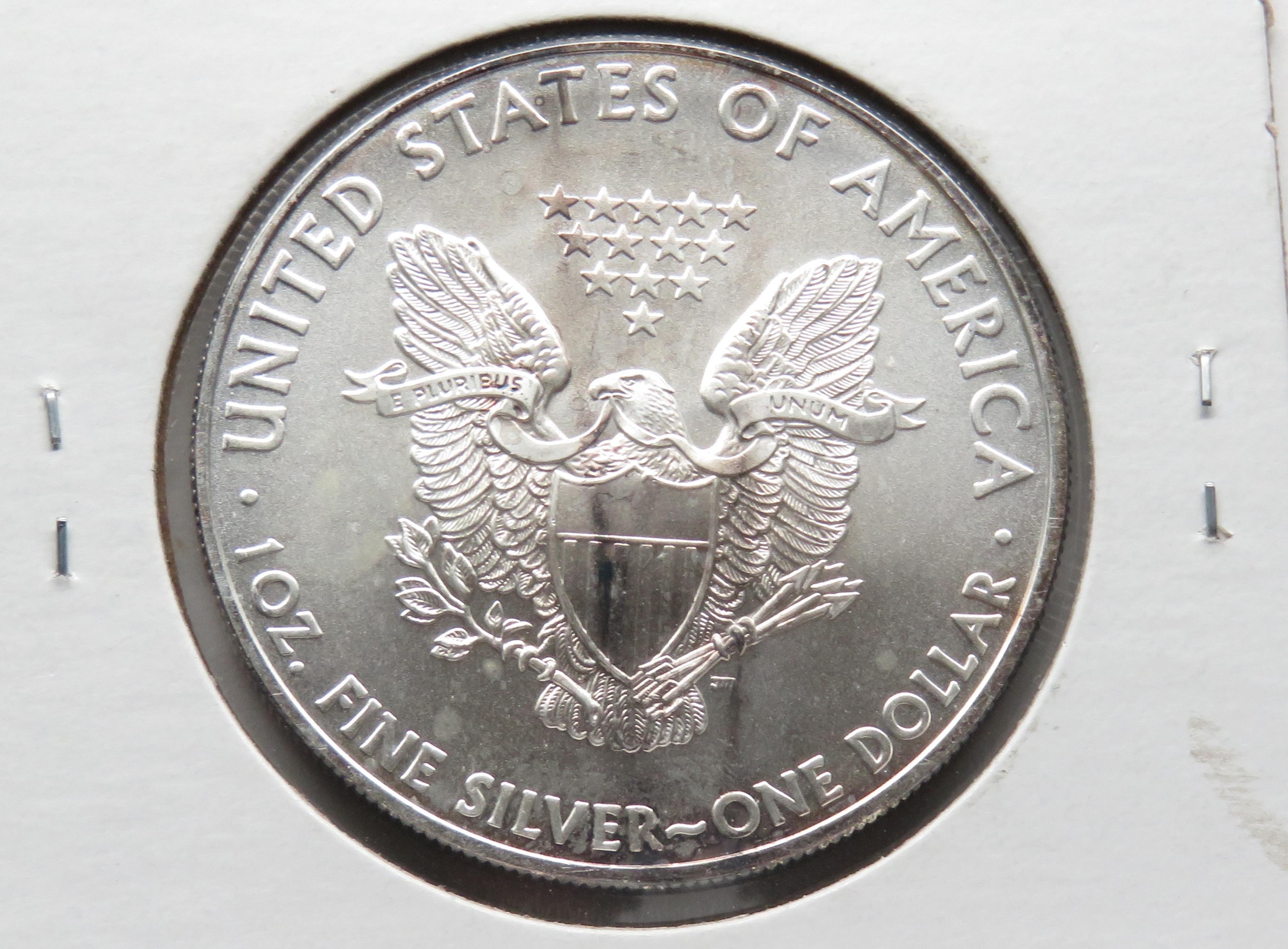 2 Silver American Eagles CH BU: 2008 toned, 2009