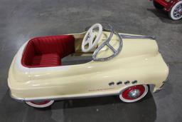 Torpedo pedal car, 38" long x 18" wide x 16" high, 8" wheels.