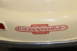 Torpedo pedal car, 38" long x 18" wide x 16" high, 8" wheels.
