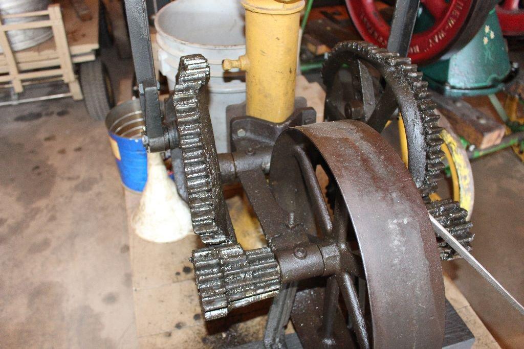 Pohlman gas engine, crooked gear, pump jack on cart, with water pump.