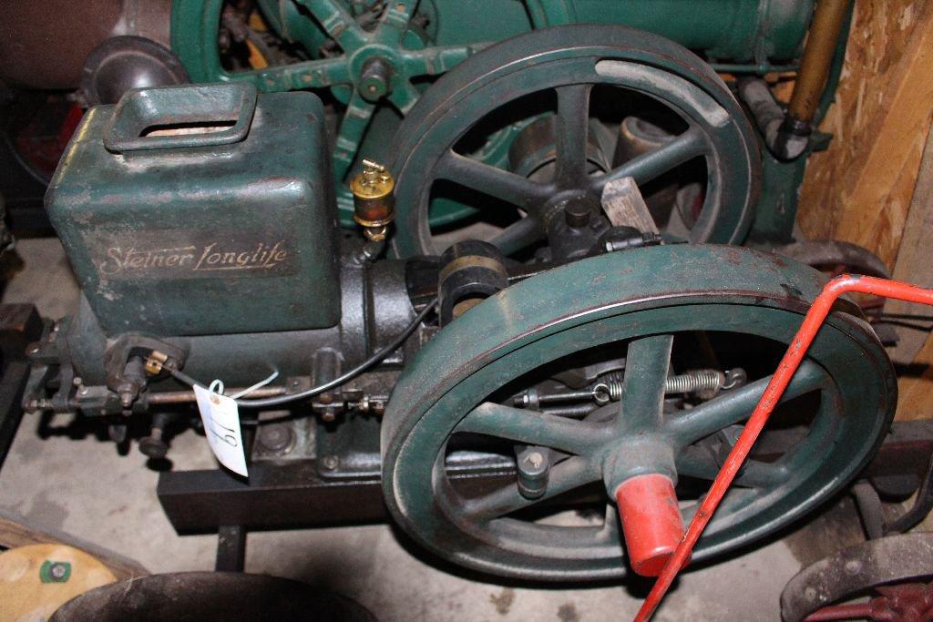 Steiner gas engine, sn 2496, 3 hp, 4.5 speed, on original trucks.