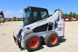 2015 Bobcat S590 skidloader, sn AR9R14768, hrs. on meter 137.