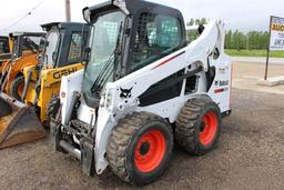 2015 Bobcat S590 skidloader, sn AR9R14768, hrs. on meter 137.