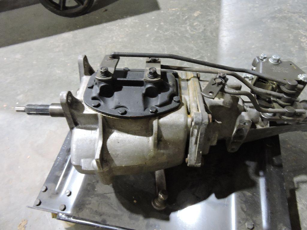 GM 4 speed transmission, model 13-04-066-90, WITH Hurst shifter linkage.