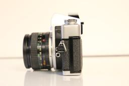 Minolta SRT 101 Camera with Lens and Leather Case