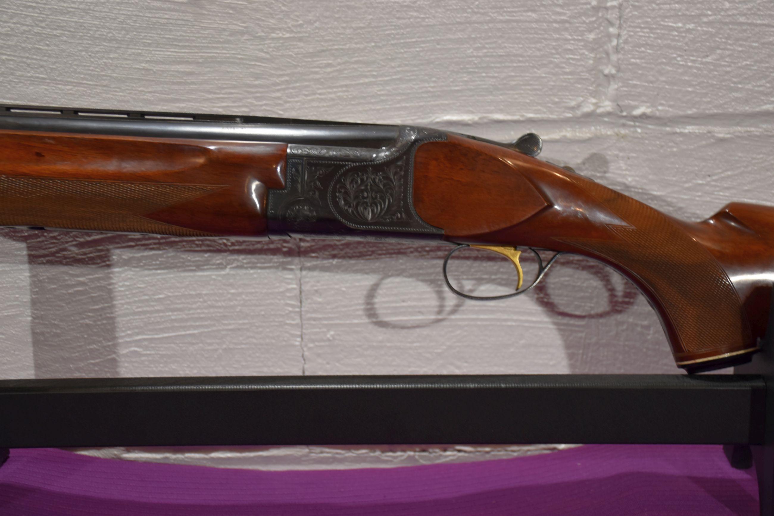 B.C. Miroku Firearms Manufacturing Co. Over under 12 Gauge Shotgun, Gold Trigger, Engraved, 3" Chamb