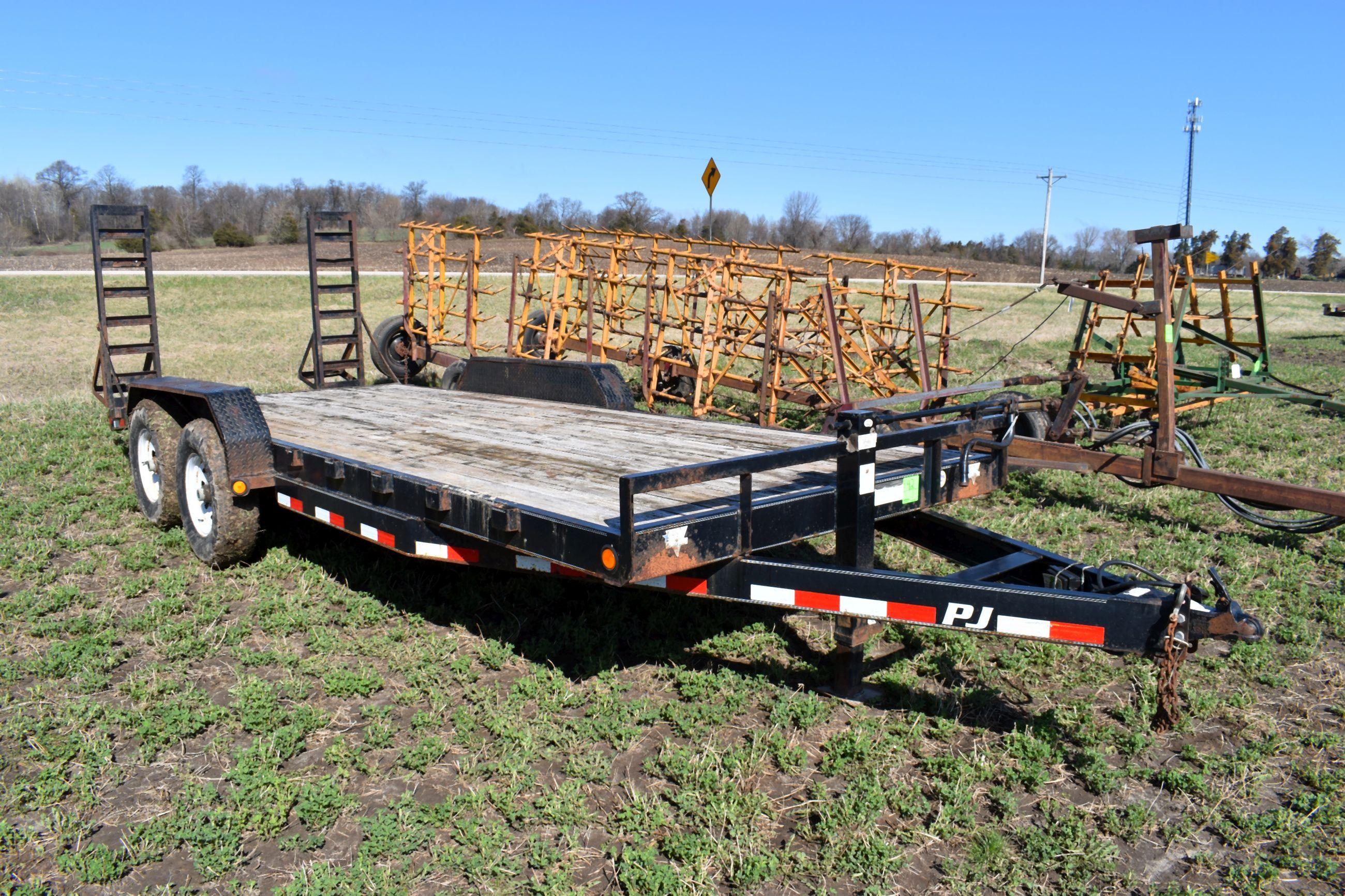 2011 PJ, 20’ Tandem Axle Trailer, 7,500 LB Axles, Flip Up Ramps, 7' Wide Bed, 16" Tires