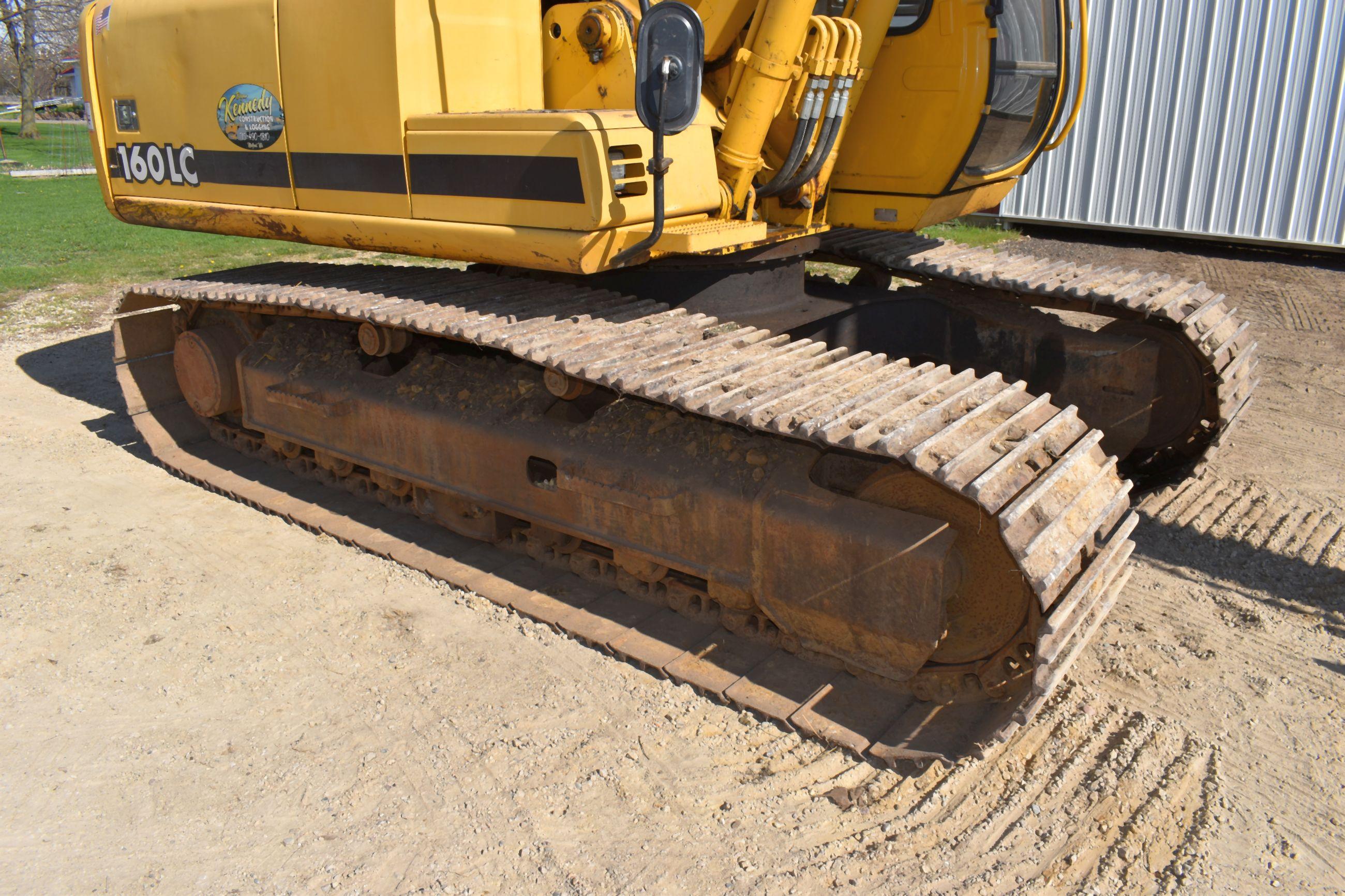 2002 John Deere 160LC Excavator, Enclosed Cab, 28” Pads, 40” Dirt Bucket With Hydraulic Thumb, New C