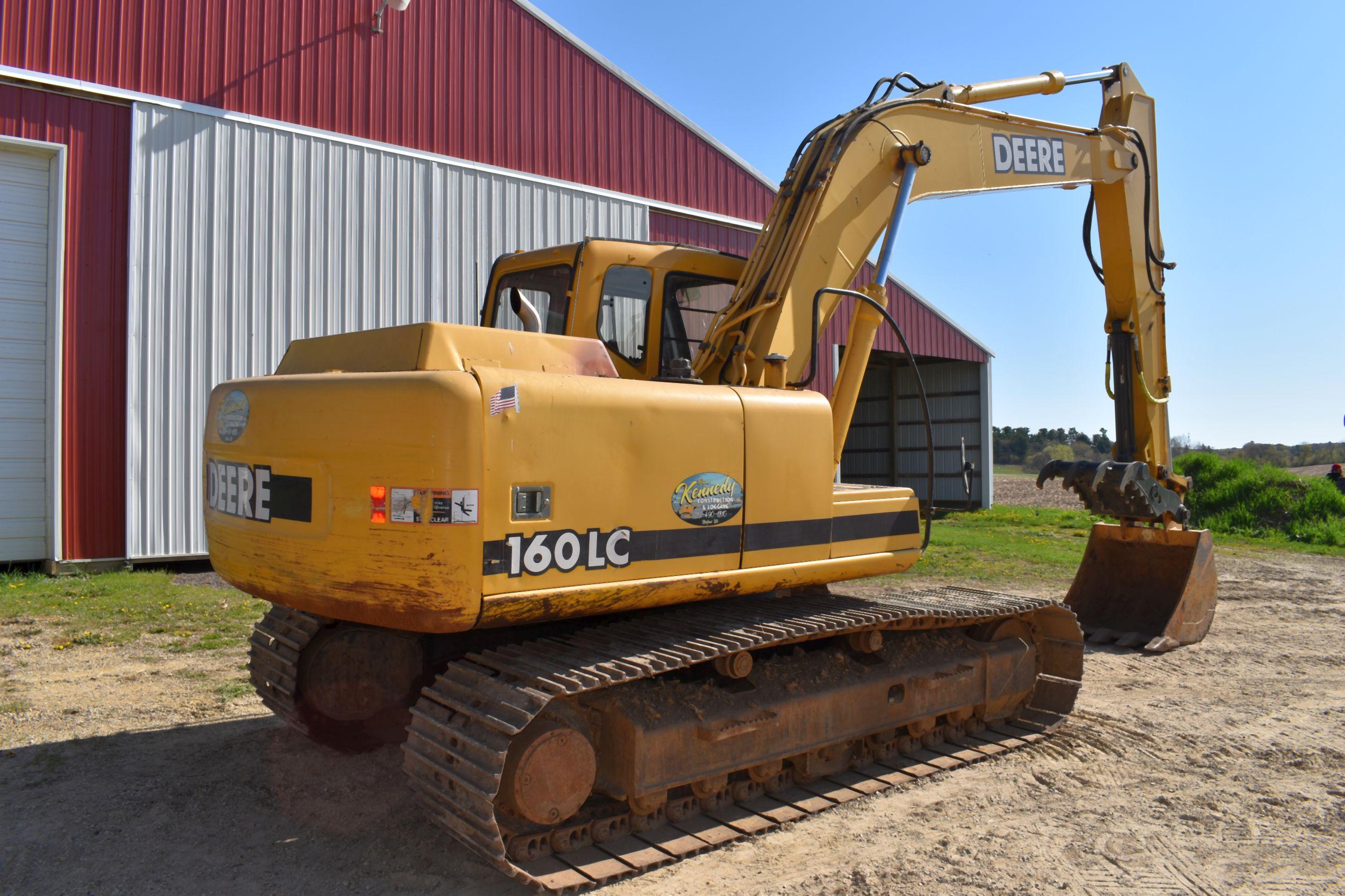 2002 John Deere 160LC Excavator, Enclosed Cab, 28” Pads, 40” Dirt Bucket With Hydraulic Thumb, New C