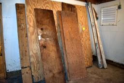 Miscellaneous plywood, 2x9x8 lumber, located building 1