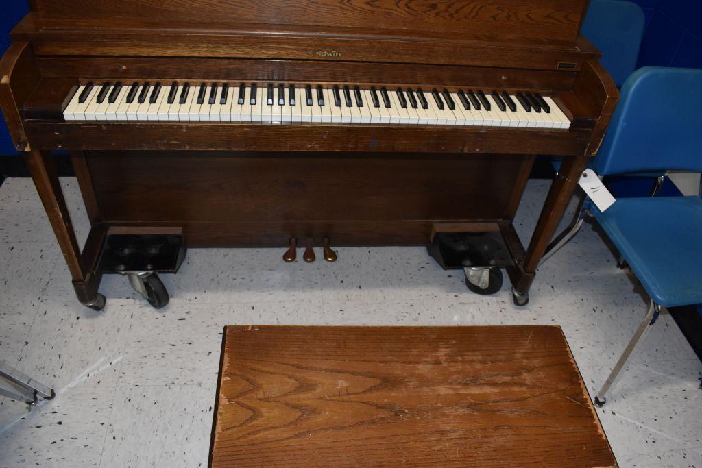 Baldwin Piano, 26" wide x 57 1/2" long x 46 high, one hammer broken