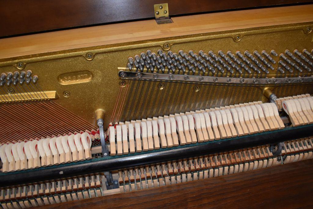 Baldwin Piano, 26" wide x 57 1/2" long x 46 high, one hammer broken