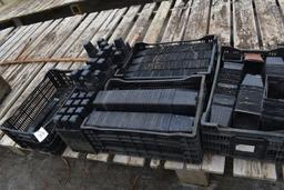 Assorted used plastic pots and trays, located in GH 24