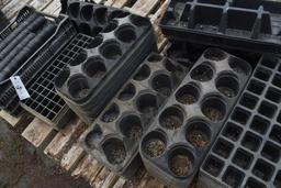 Assortment of plastic plug trays and pots, located in GH 24