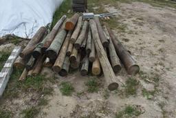 Approximately 40 Wooden Fence Post