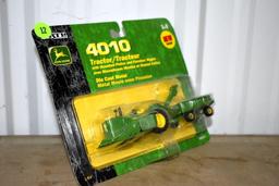 Ertl John Deere 4010 Tractor with mounted picker and flair box wagon, on card, 1/64th