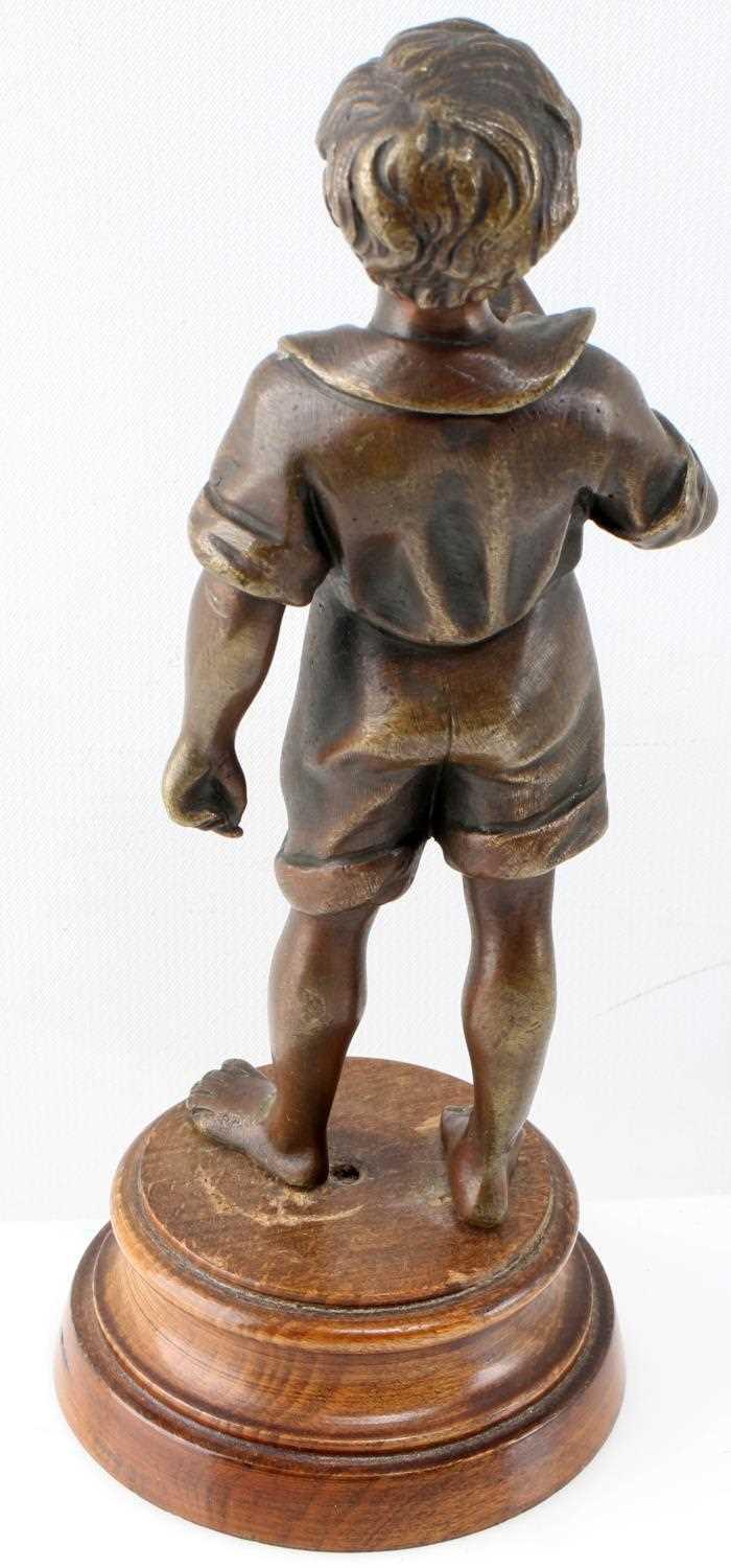 SMALL CAST BRONZE SCULPTURE OF LITTLE BOY