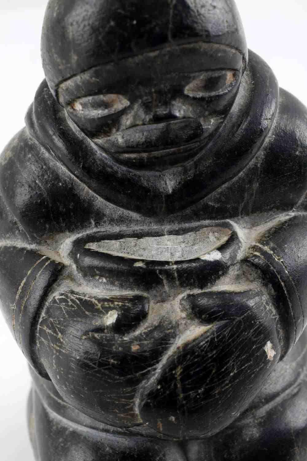 INUIT SOAPSTONE CARVING OF MALE FIGURE