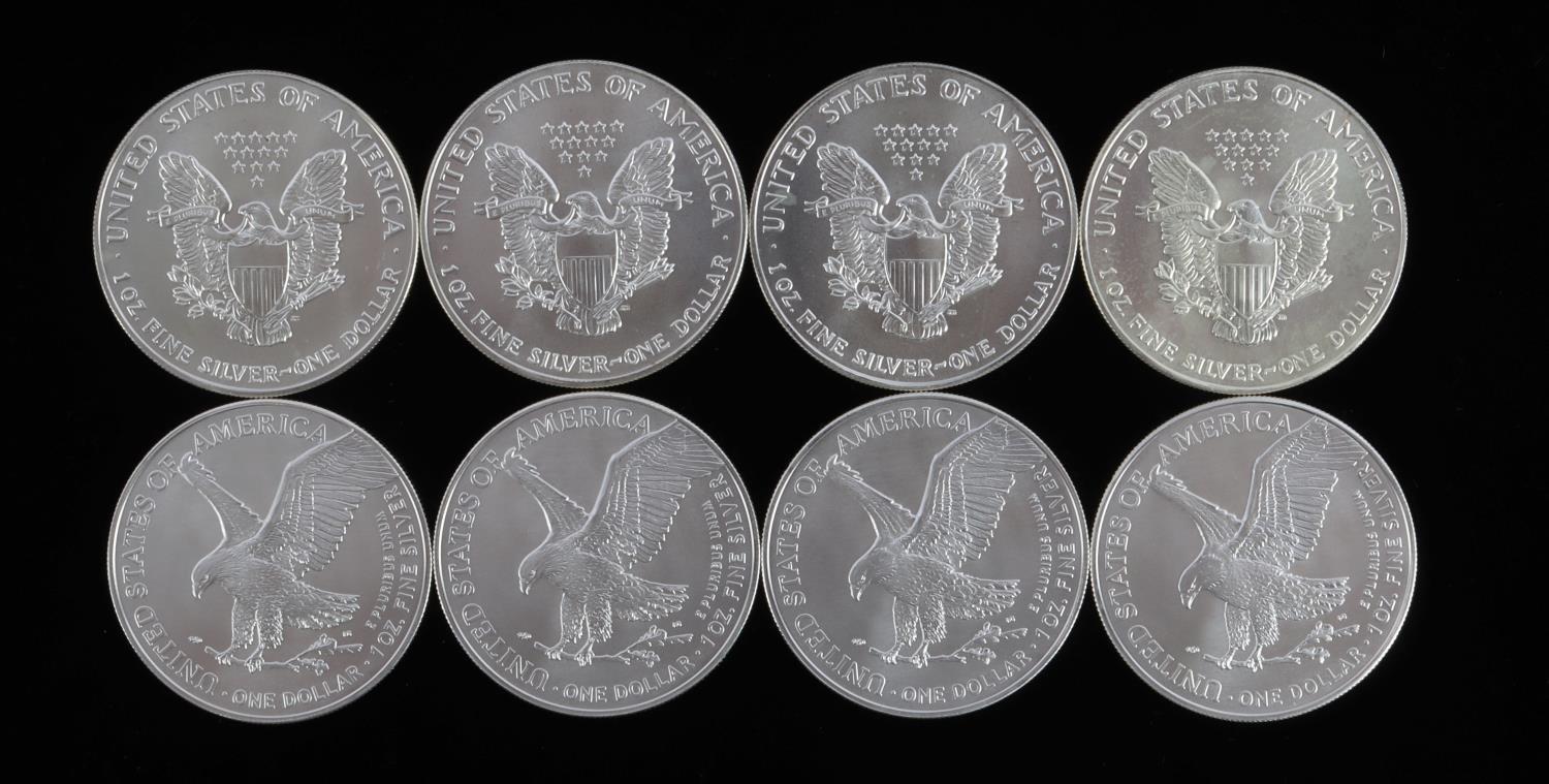 8 AMERICAN EAGLE 1 OZ SILVER COINS