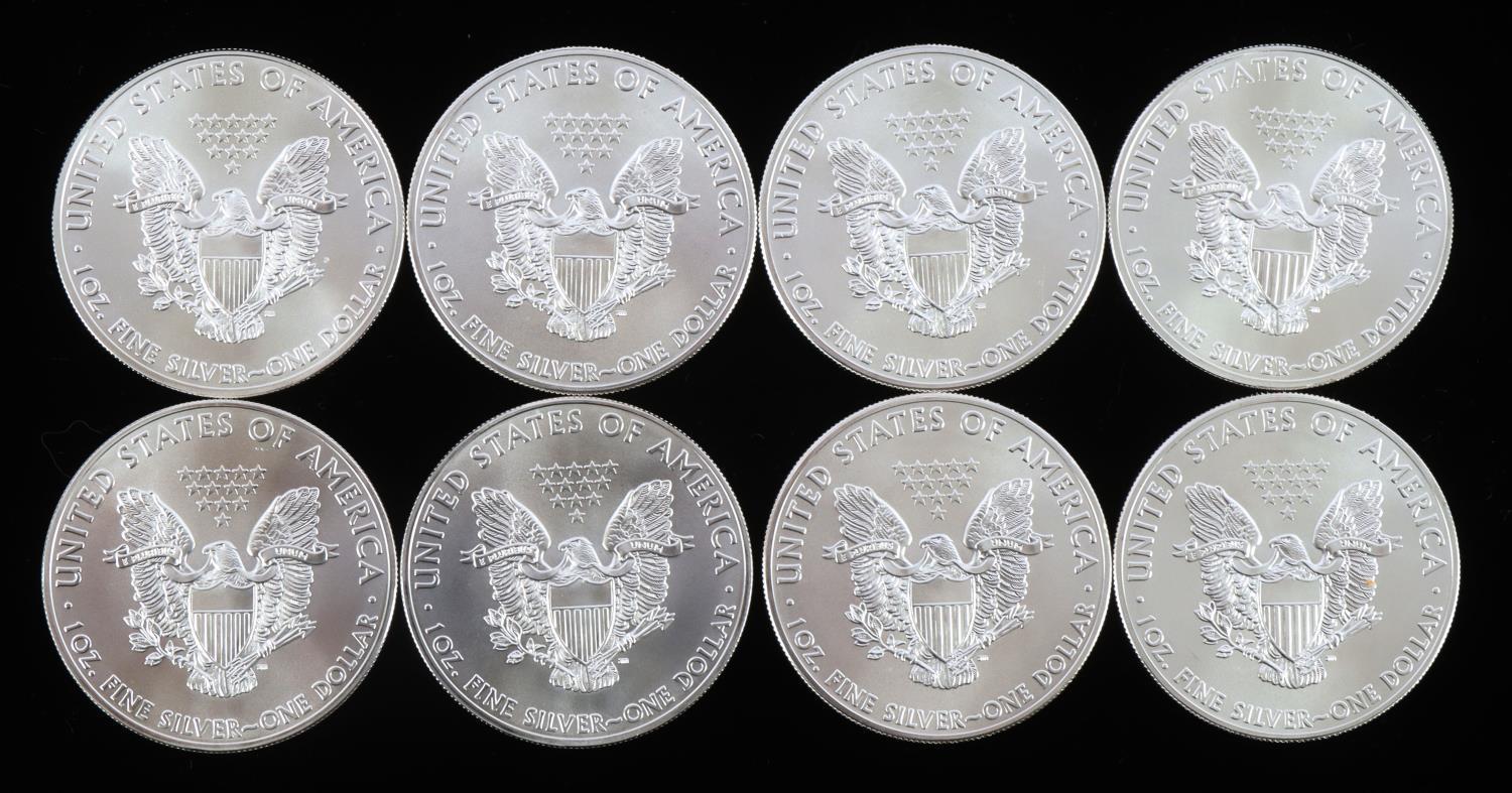8 AMERICAN EAGLE 1OZ SILVER DOLLAR COINS