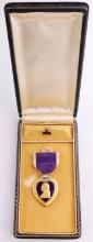 WWII CASED AND NAMED PURPLE HEART MEDAL