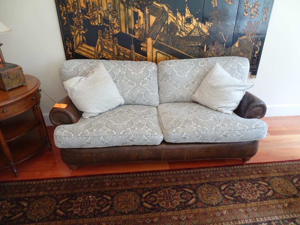 Michael Thomas leather/upholstered sofa-81" long x 32" deep x 38" tall. Plus 2 pillows.
