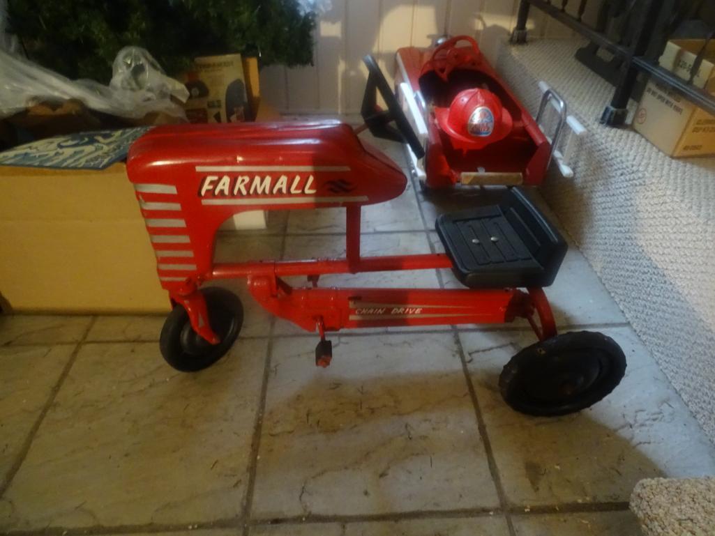 Farmall tractor pedal car. "Chain Drive" Excellent condition.Heavy.