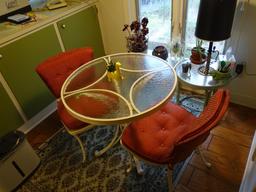 Wrought iron Kitchen table (30" round) and 2 chairs w/2 side tables, lamp and knickknacks on tables.