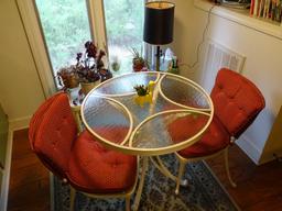 Wrought iron Kitchen table (30" round) and 2 chairs w/2 side tables, lamp and knickknacks on tables.